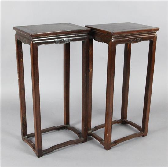 A pair of Chinese hardwood flower stands, possibly huanghuali 17th / 18th century, W.42.5cm H.85cm D.31.5cm, old repairs and replacemen